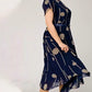 👗2025 Nouvelle conception✨️Robe à manches courtes en maille imprimée à pois